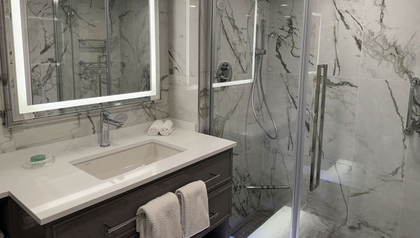 The bathroom in a refurbished Penthouse Suite.