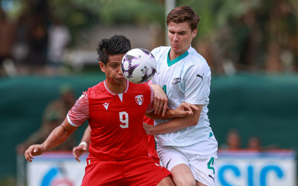 Tahiti's Tauhiti Keck New Zealand's Tyler Bindon.