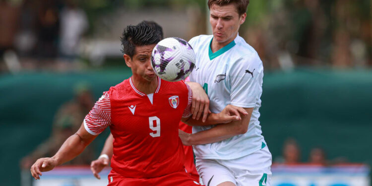 Tahiti's Tauhiti Keck New Zealand's Tyler Bindon.